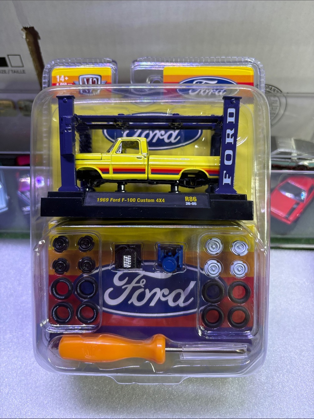 M2 Ford Yellow & Red 1969 F-100 Custom 4x4 Toy Truck with Accessories